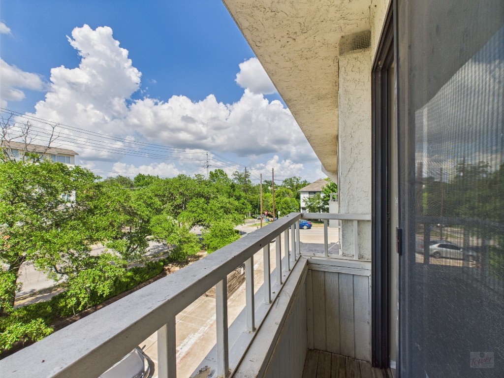 3115 Helms Street, Unit 202 Austin, TX 78705 - Photo 15 of 26 a view of balcony and yard