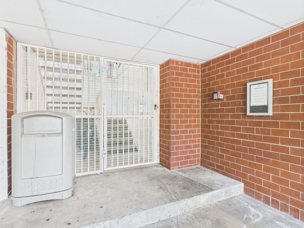 3115 Helms Street, Unit 202 Austin, TX 78705 - Photo 23 of 26 a view of a door with wooden floor