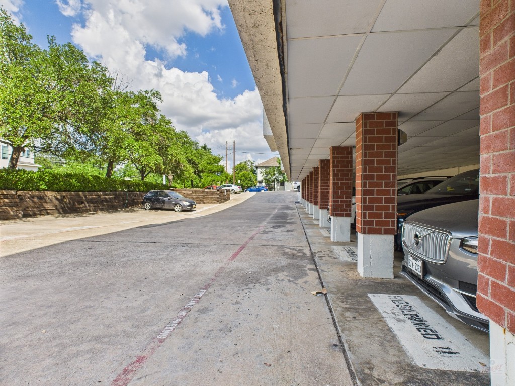 3115 Helms Street, Unit 202 Austin, TX 78705 - Photo 25 of 26 a view of a backyard of the house