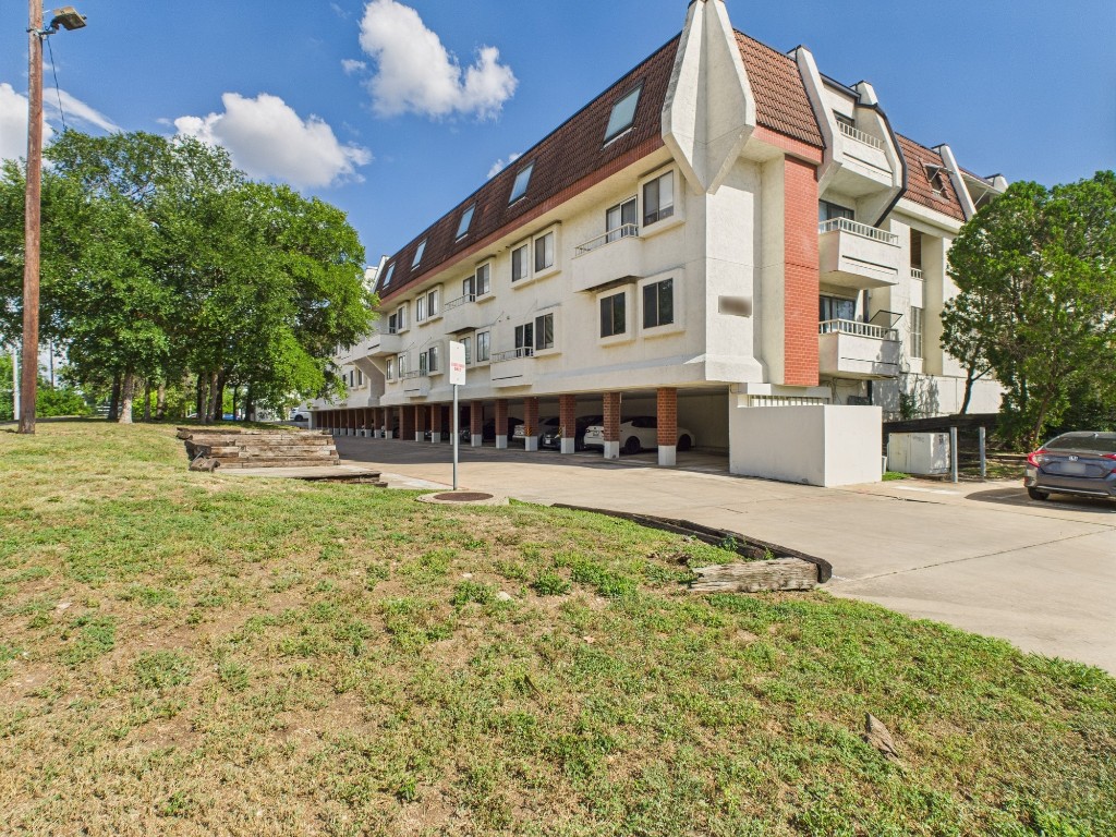 3115 Helms Street, Unit 202 Austin, TX 78705 - Photo 26 of 26 a view of a building with a swimming pool