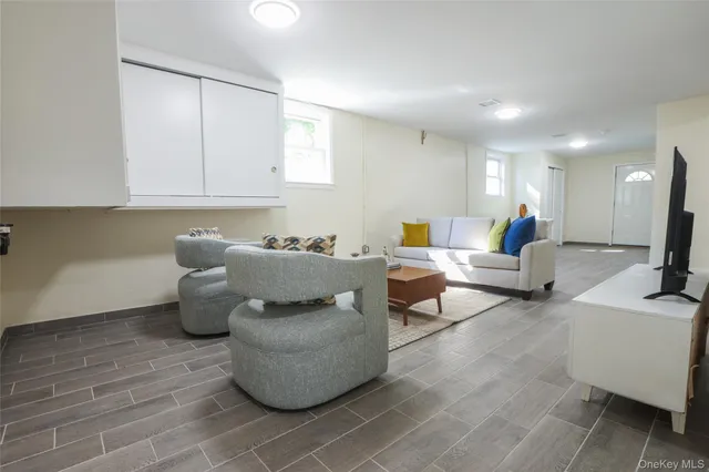 a view of a room with a table and a chair