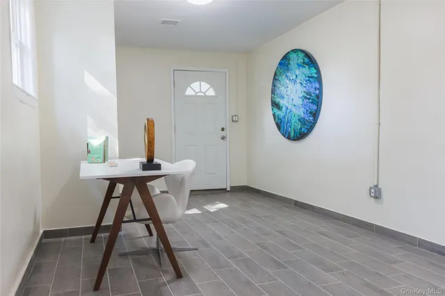 a view of swimming pool with outdoor seating