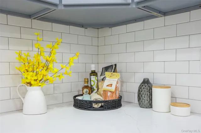 a view of a room with wooden floor and cabinet