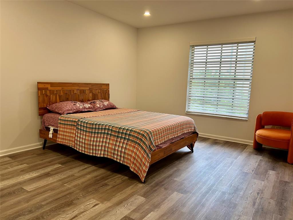 2151 Northeast 68th Street, Unit 226 Fort Lauderdale, FL 33308 - Photo 13 of 49 a bedroom with a bed and a window