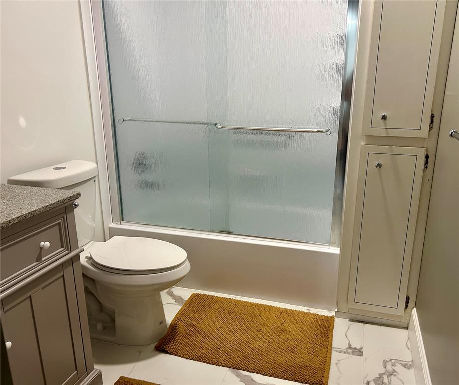 2151 Northeast 68th Street, Unit 226 Fort Lauderdale, FL 33308 - Photo 15 of 49 a bathroom with a sink and a toilet