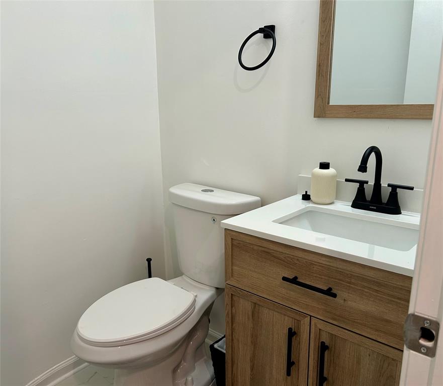 2151 Northeast 68th Street, Unit 226 Fort Lauderdale, FL 33308 - Photo 21 of 49 a bathroom with a sink and a toilet
