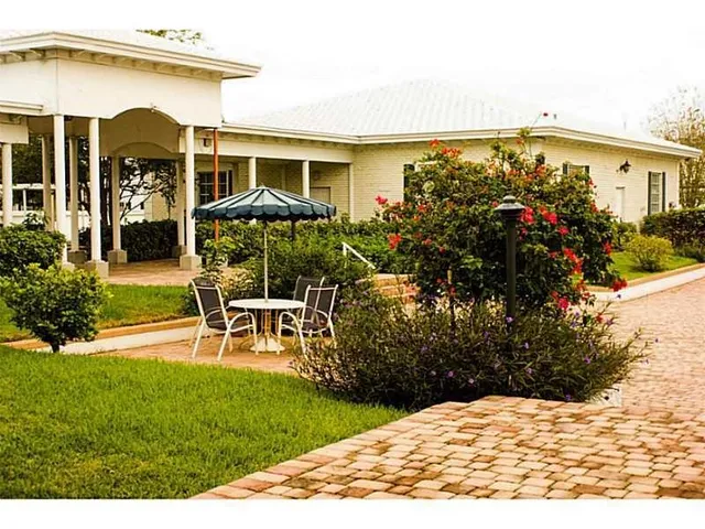 a front view of a house with a porch