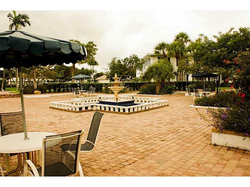 2151 Northeast 68th Street, Unit 226 Fort Lauderdale, FL 33308 - Photo 43 of 49 a view of swimming pool with outdoor seating