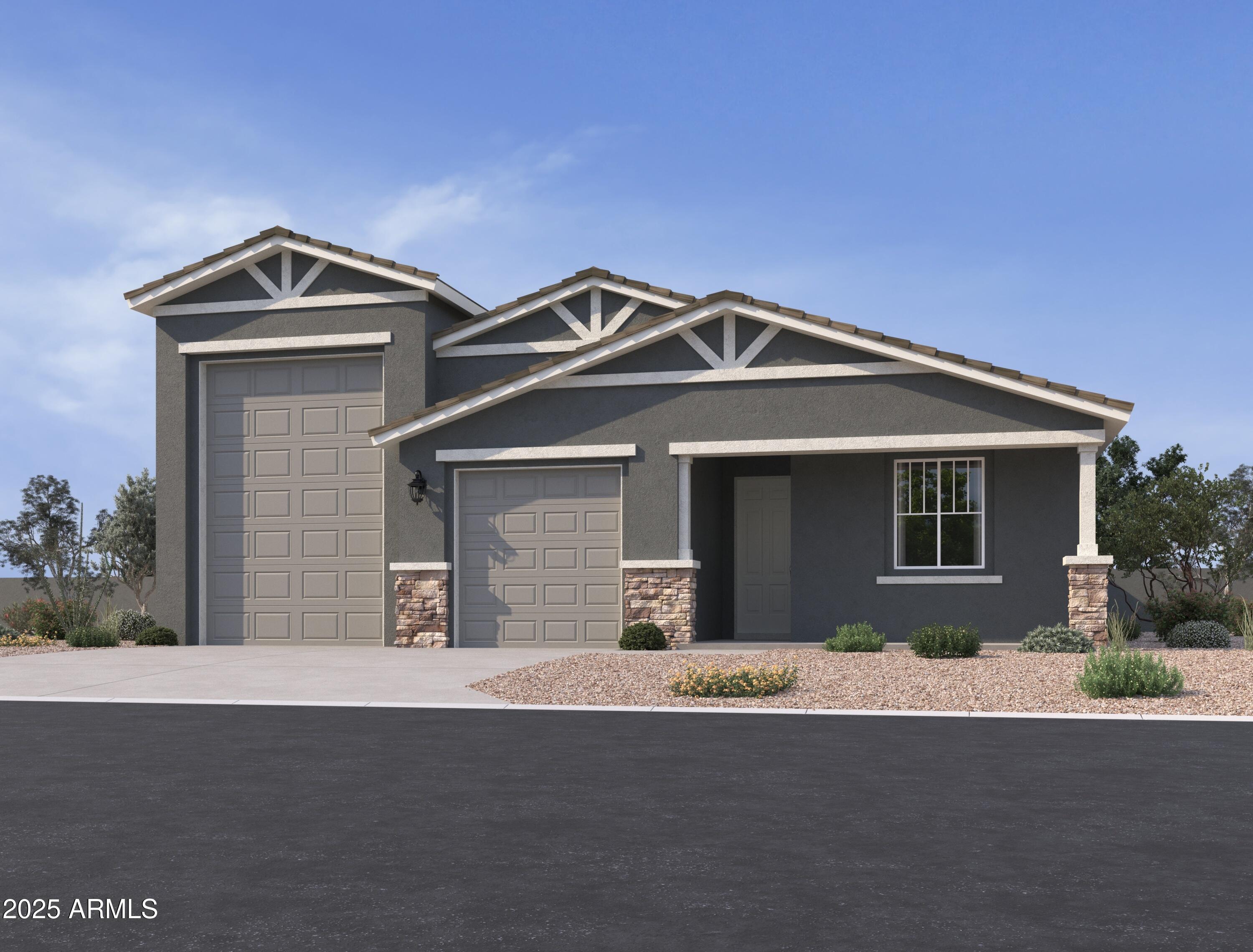 15710 West Brown Street Waddell, AZ 85355 - Photo 1 of 22 a front view of a house with yard