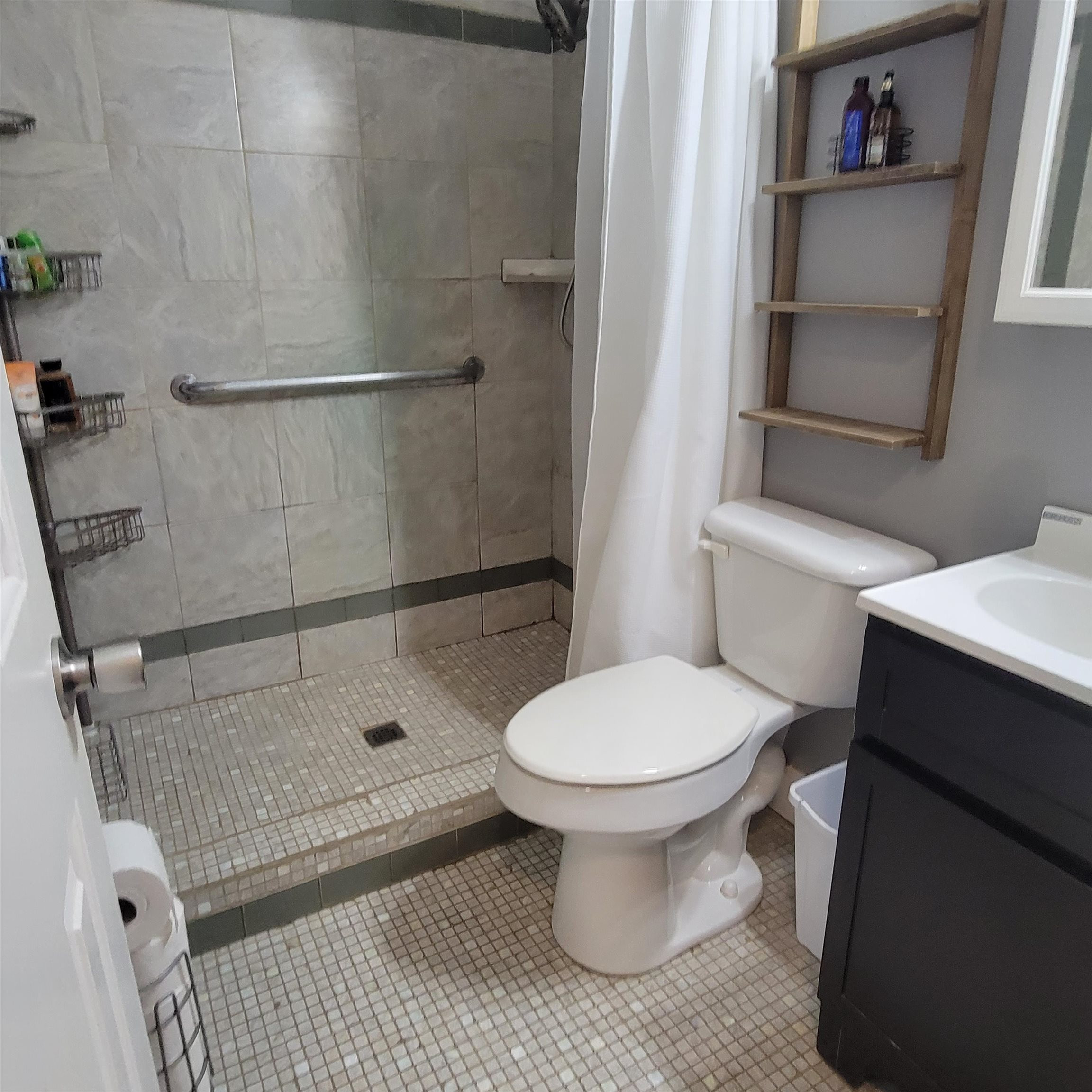 3106 Riverside Drive Jackson, TN 38301 - Photo 12 of 19 a bathroom with a toilet and a shower
