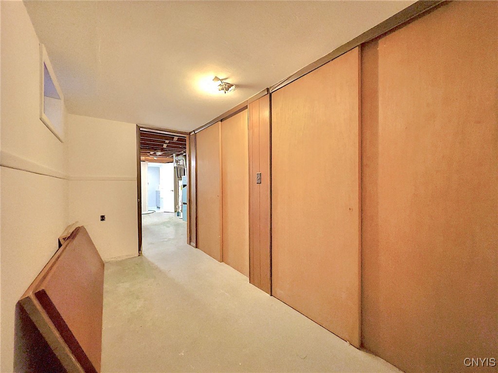 135 Glen Road Rome, NY 13440 - Photo 20 of 34 Basement hallway