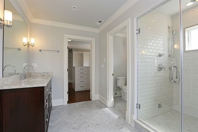 116 South Adams Street Hinsdale, IL 60521 - Photo 15 of 25 a bathroom with a granite countertop sink shower and a mirror
