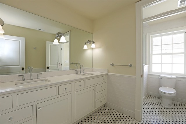116 South Adams Street Hinsdale, IL 60521 - Photo 18 of 25 a bathroom with a sink a toilet and a mirror