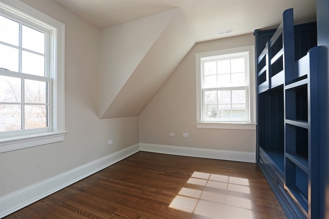 116 South Adams Street Hinsdale, IL 60521 - Photo 19 of 25 an empty room with wooden floor and windows