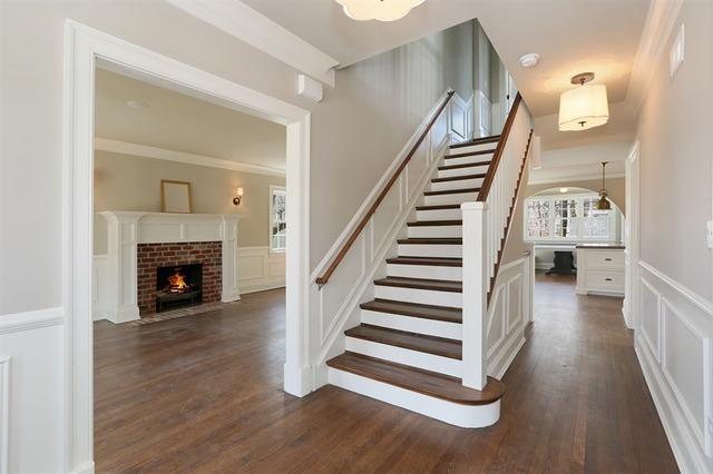 116 South Adams Street Hinsdale, IL 60521 - Photo 2 of 25 a view of a livingroom with wooden floor and a fireplace