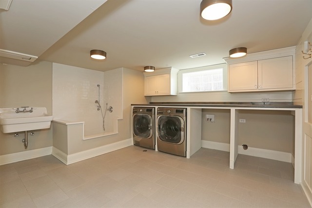 116 South Adams Street Hinsdale, IL 60521 - Photo 21 of 25 a view of a kitchen with a sink washer and dryer