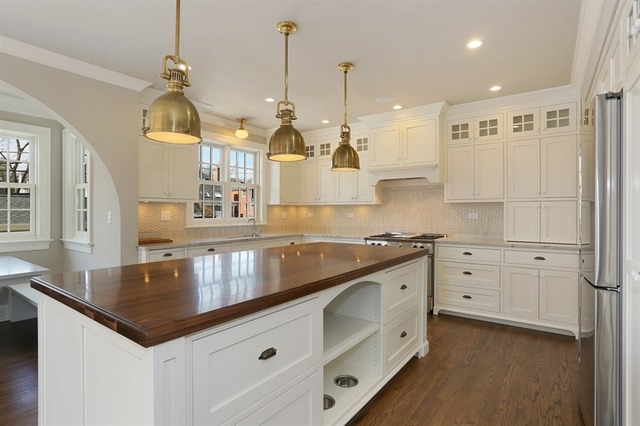 116 South Adams Street Hinsdale, IL 60521 - Photo 6 of 25 a kitchen with stainless steel appliances granite countertop a sink a stove and a wooden floors