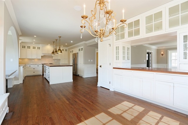 116 South Adams Street Hinsdale, IL 60521 - Photo 8 of 25 a view of a kitchen with wooden floor and electronic appliances