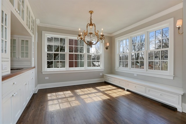 116 South Adams Street Hinsdale, IL 60521 - Photo 9 of 25 a view of an empty room with wooden floor and a window