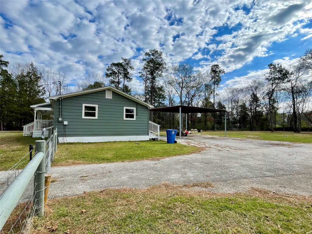 2504 Davisville Road Lufkin, TX 75901 - Photo 18 of 26 a view of backyard with swimming pool