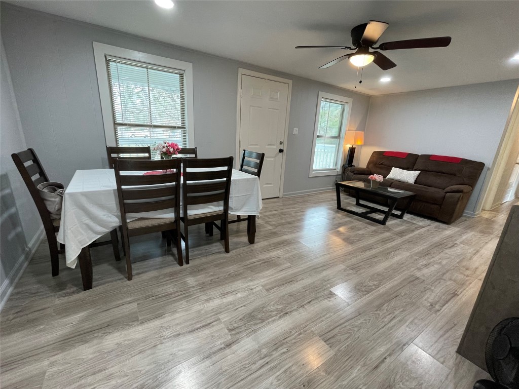 2504 Davisville Road Lufkin, TX 75901 - Photo 6 of 26 a living room with furniture and a wooden floor