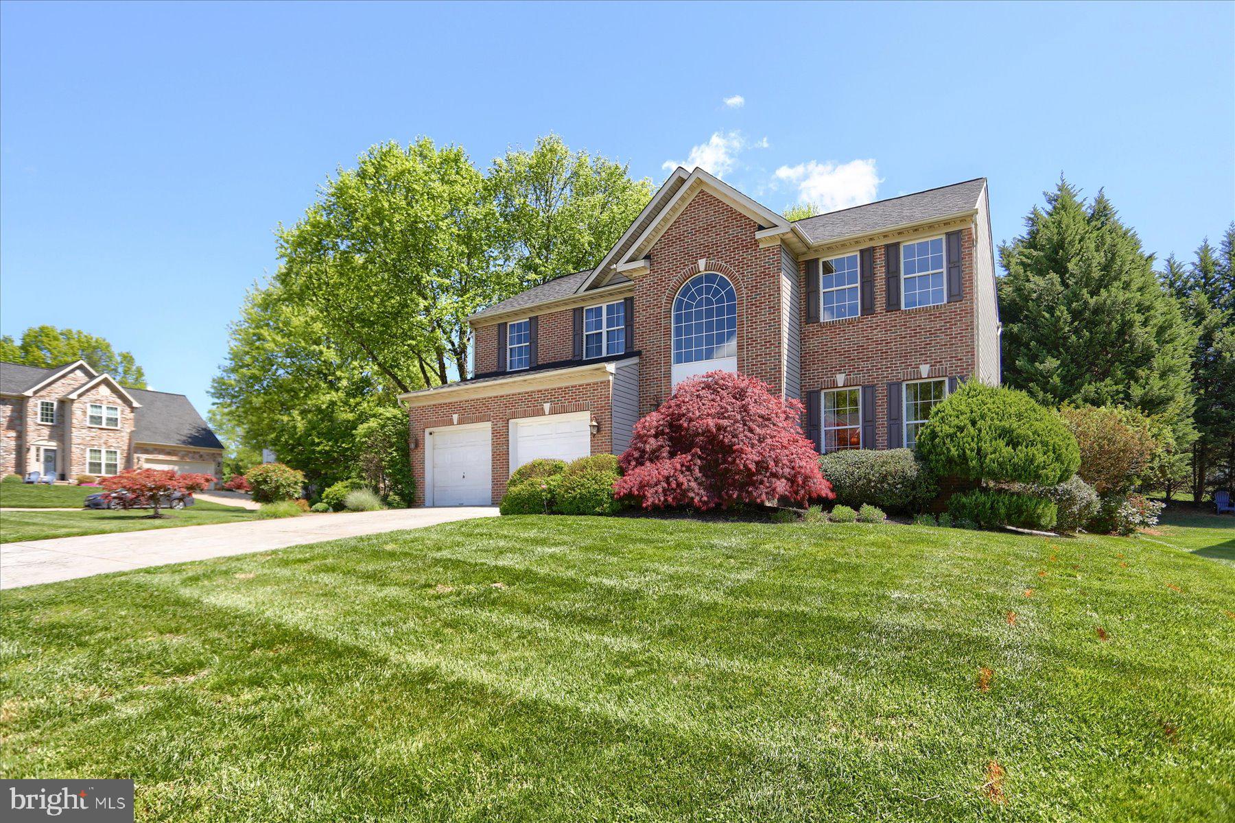 631 Prestwick Trail Bel Air, MD 21014 - Photo 1 of 64 a front view of a house with a garden