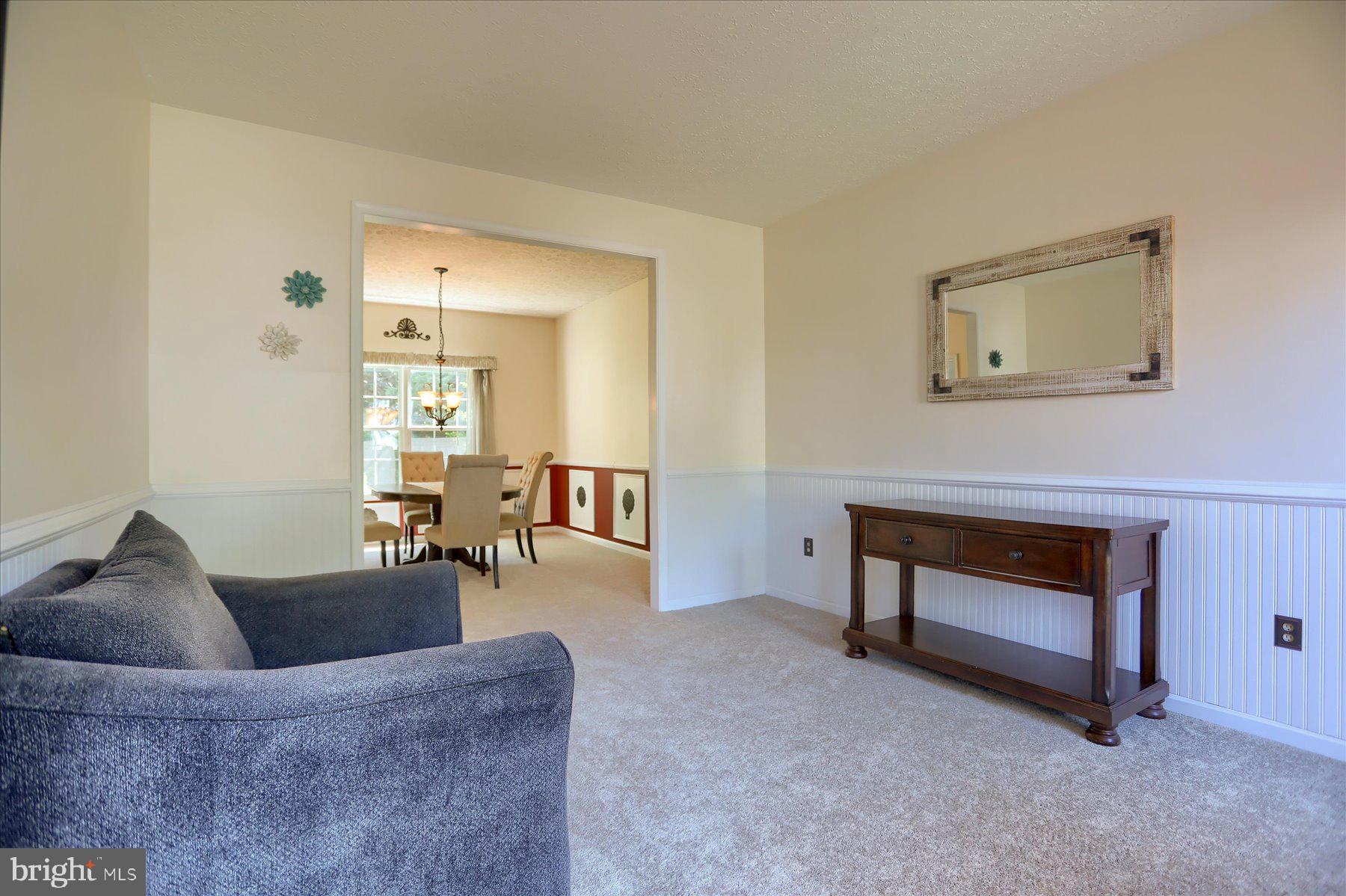 631 Prestwick Trail Bel Air, MD 21014 - Photo 23 of 64 a living room with furniture and a fireplace