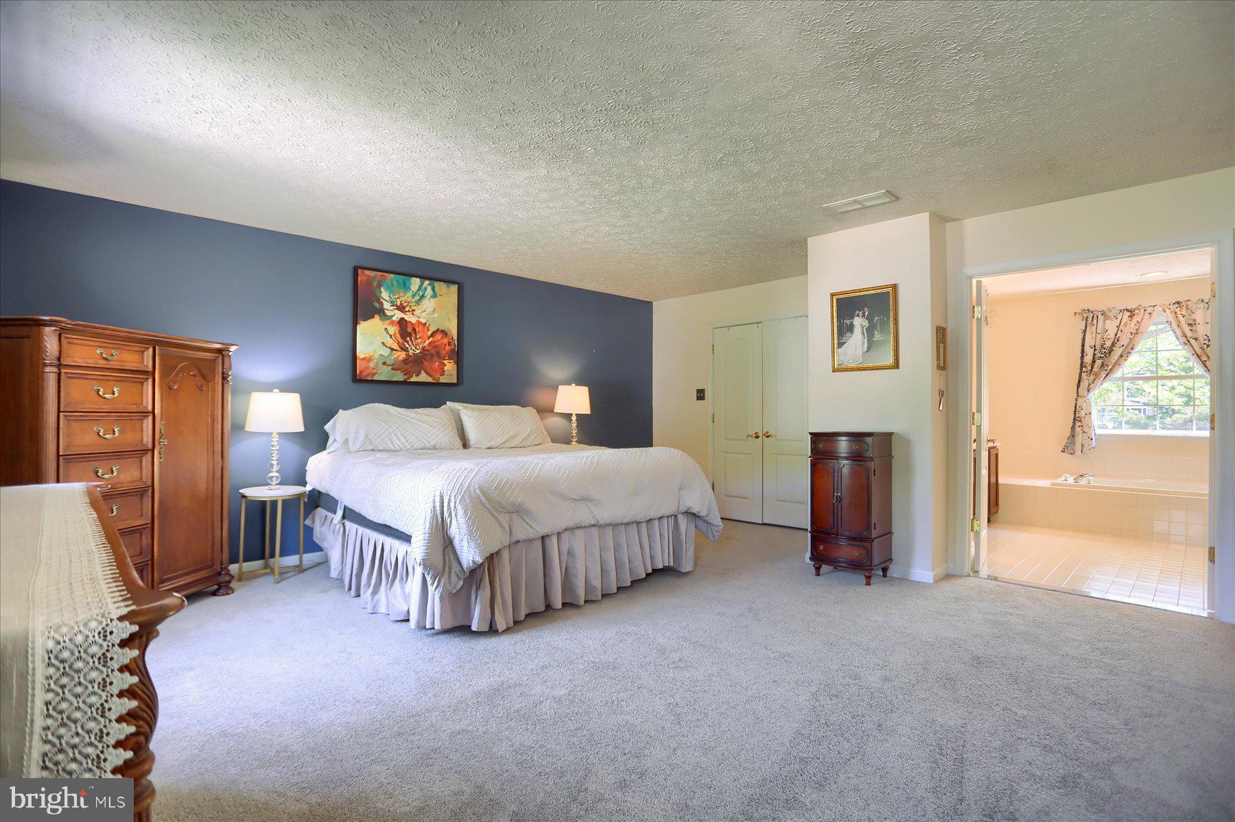 631 Prestwick Trail Bel Air, MD 21014 - Photo 27 of 64 a bedroom with a bed and a couch