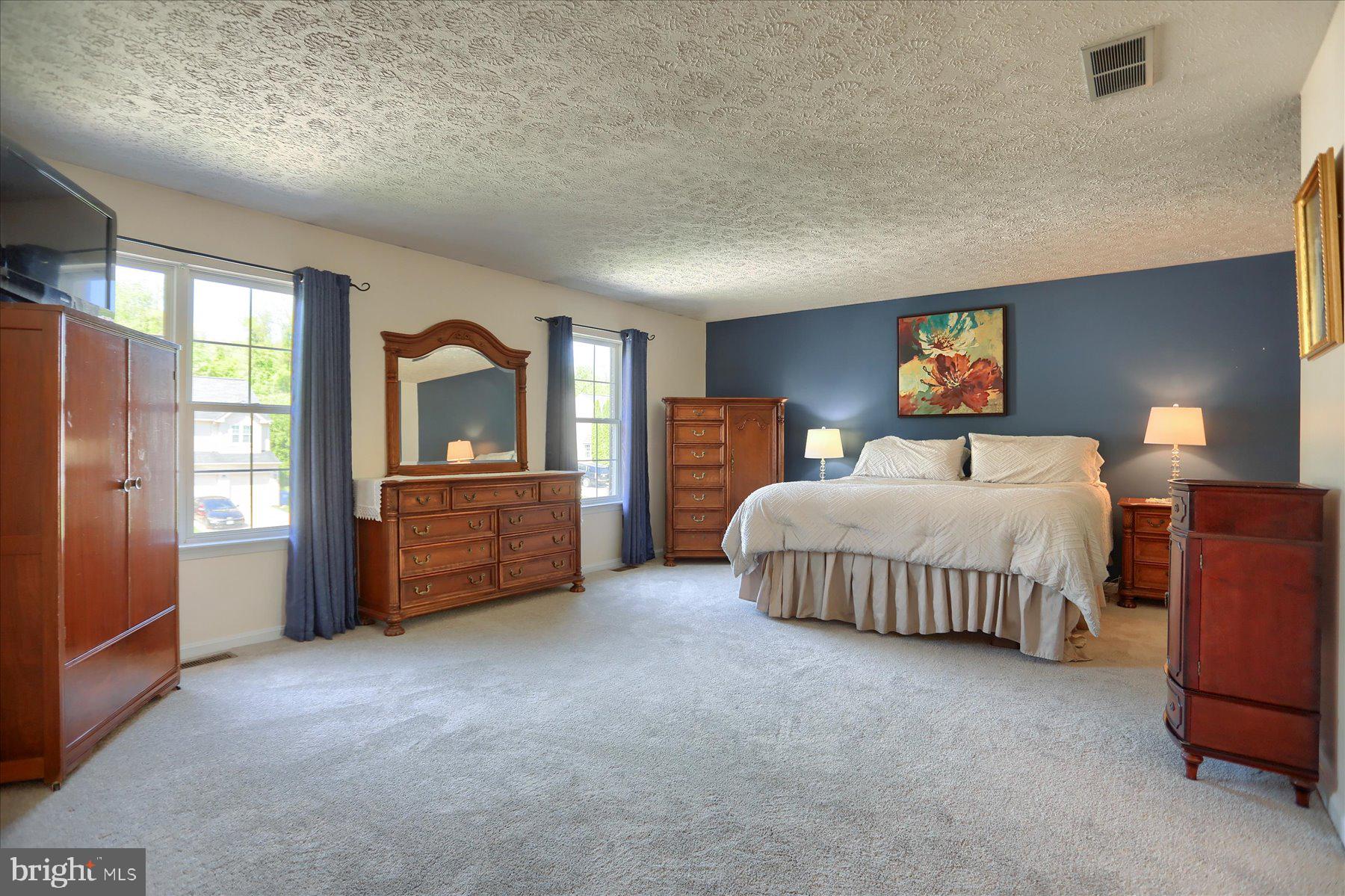 631 Prestwick Trail Bel Air, MD 21014 - Photo 28 of 64 a bedroom with a bed and a couch