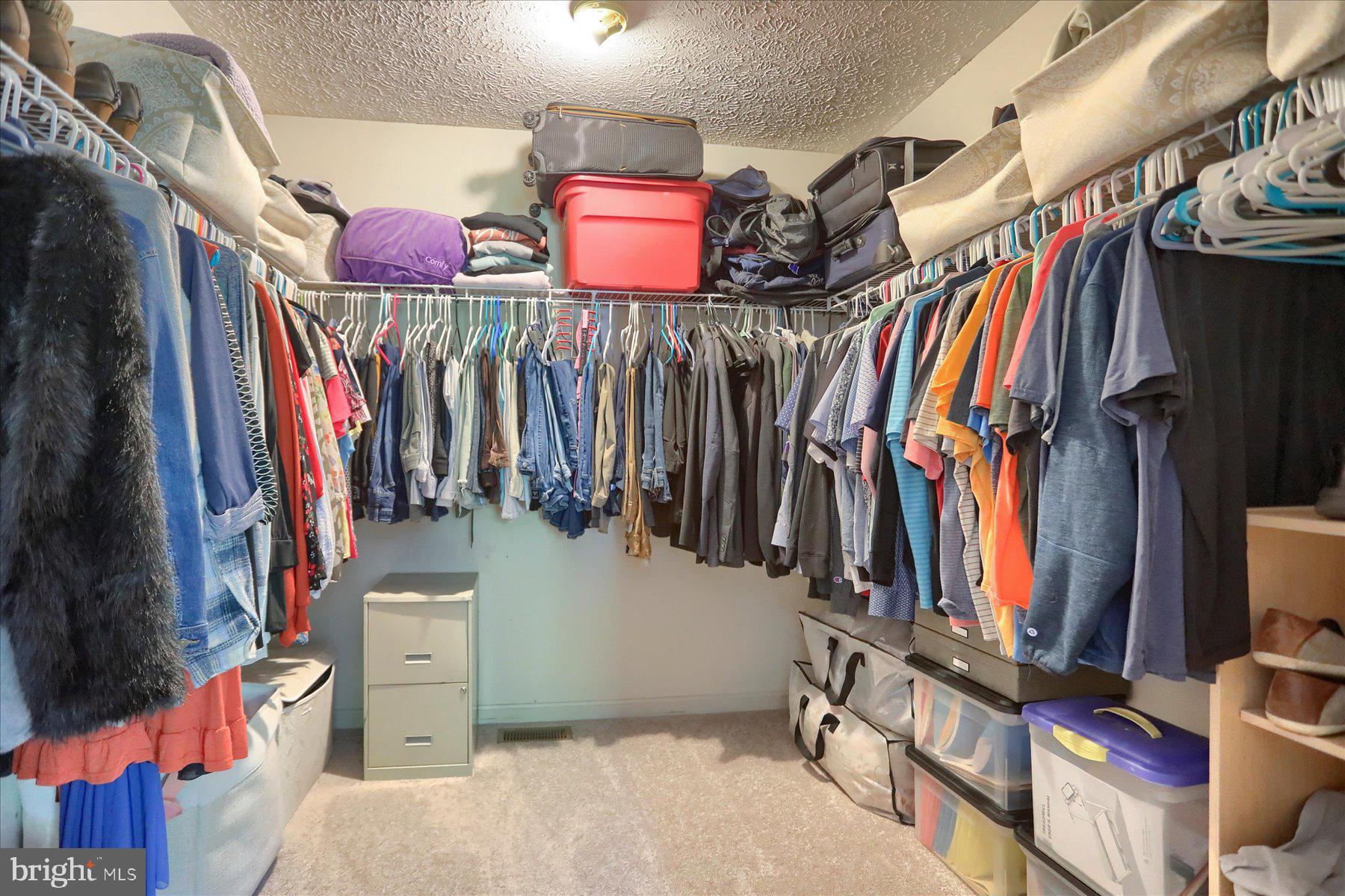 631 Prestwick Trail Bel Air, MD 21014 - Photo 29 of 64 a view of walk in closet with clothes and shoes