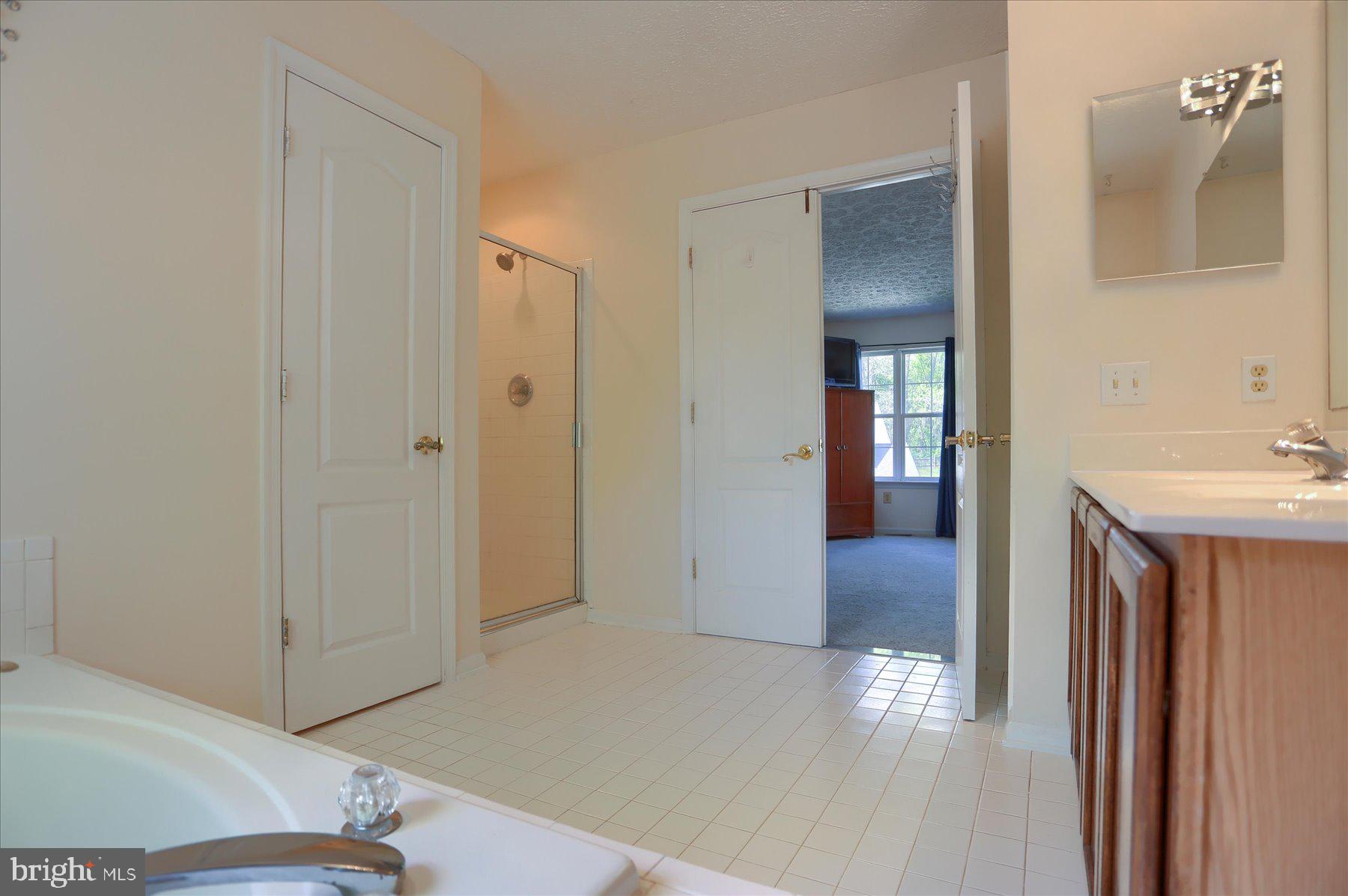 631 Prestwick Trail Bel Air, MD 21014 - Photo 31 of 64 a view of a hallway with wooden floor and cabinet