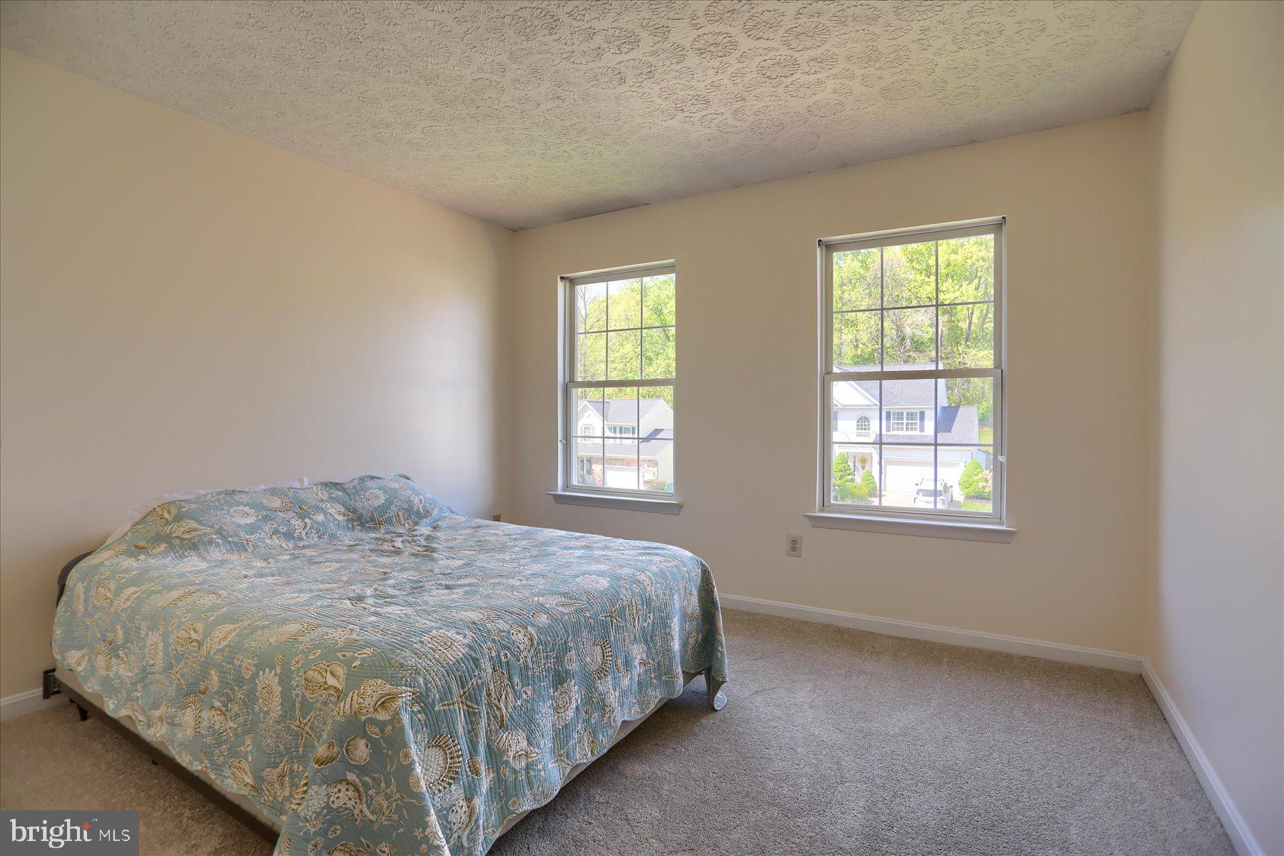 631 Prestwick Trail Bel Air, MD 21014 - Photo 34 of 64 a bedroom with a bed and window