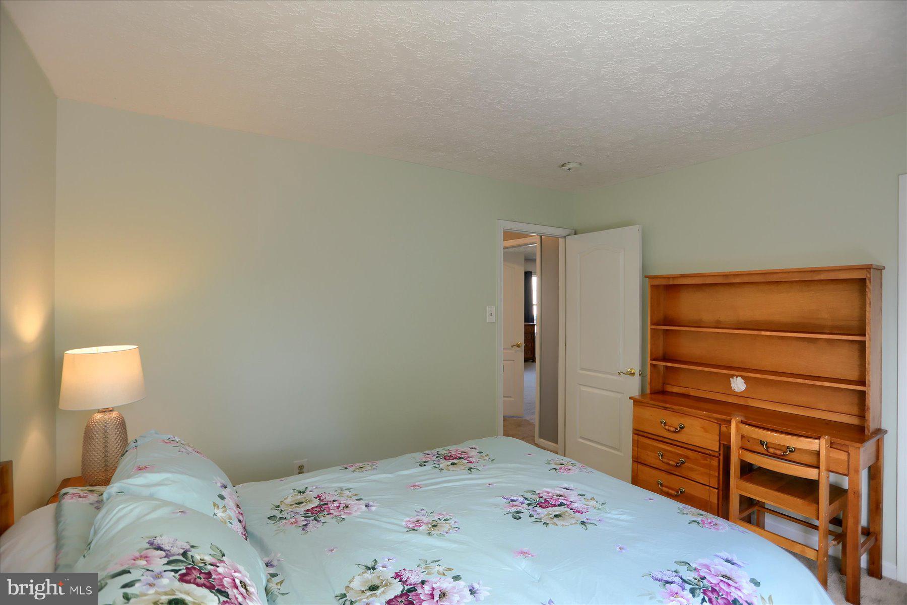 631 Prestwick Trail Bel Air, MD 21014 - Photo 38 of 64 a bedroom with a bed and a dresser in it