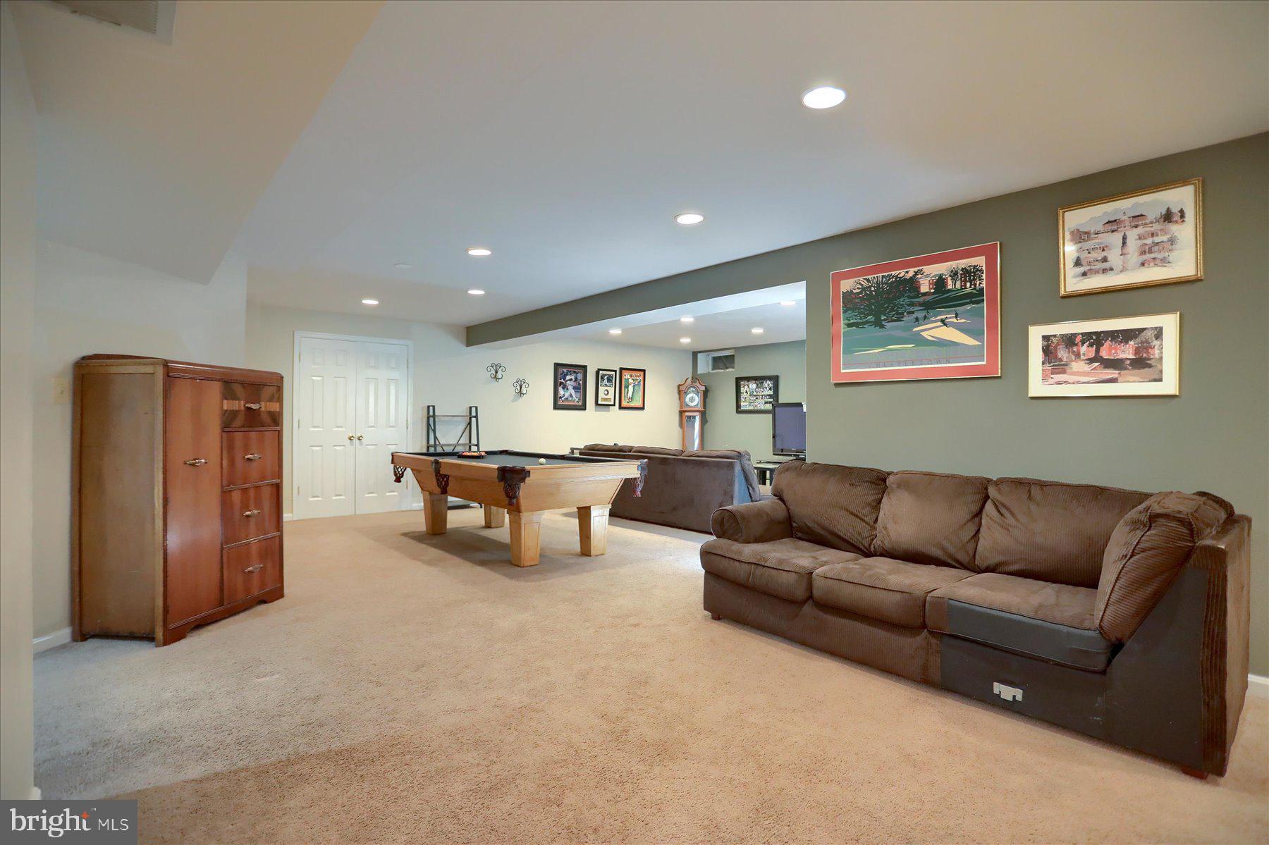 631 Prestwick Trail Bel Air, MD 21014 - Photo 43 of 64 a living room with furniture and a refrigerator
