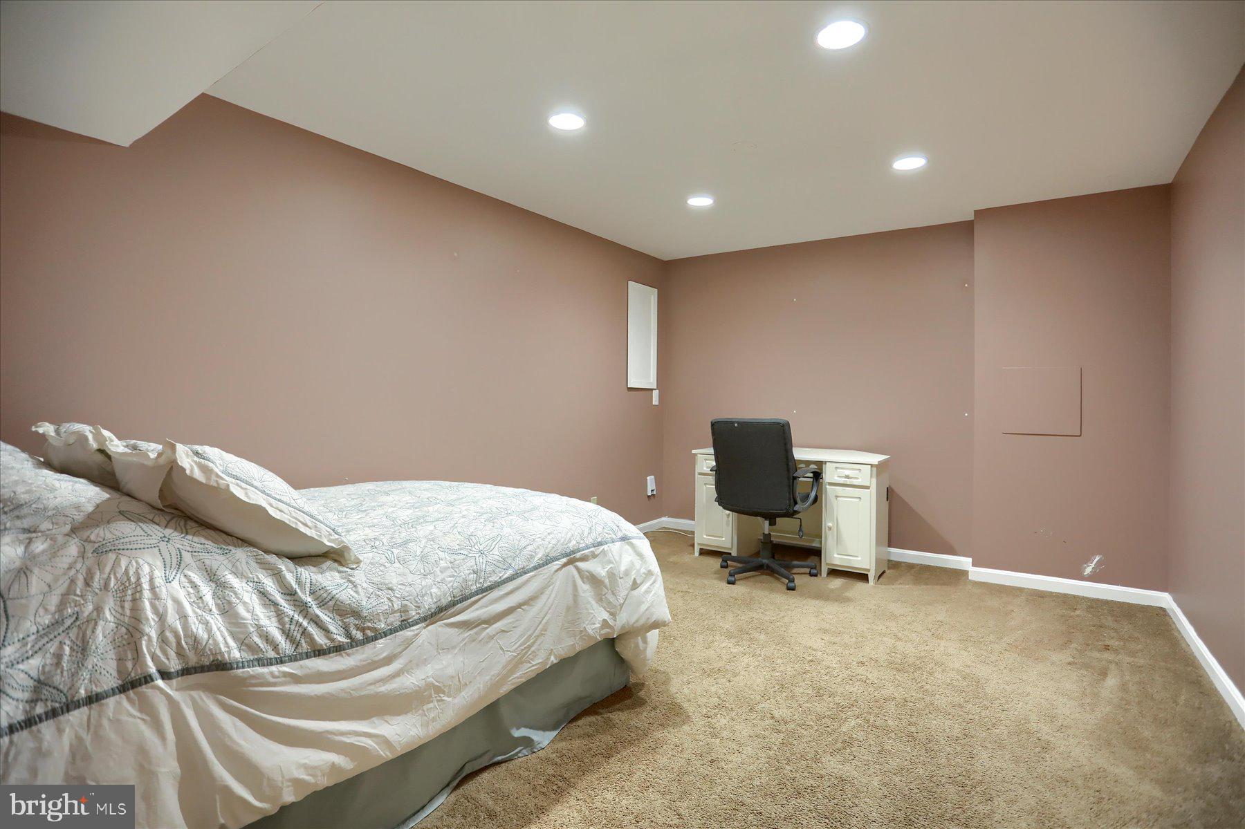 631 Prestwick Trail Bel Air, MD 21014 - Photo 46 of 64 a bedroom with a bed and chair