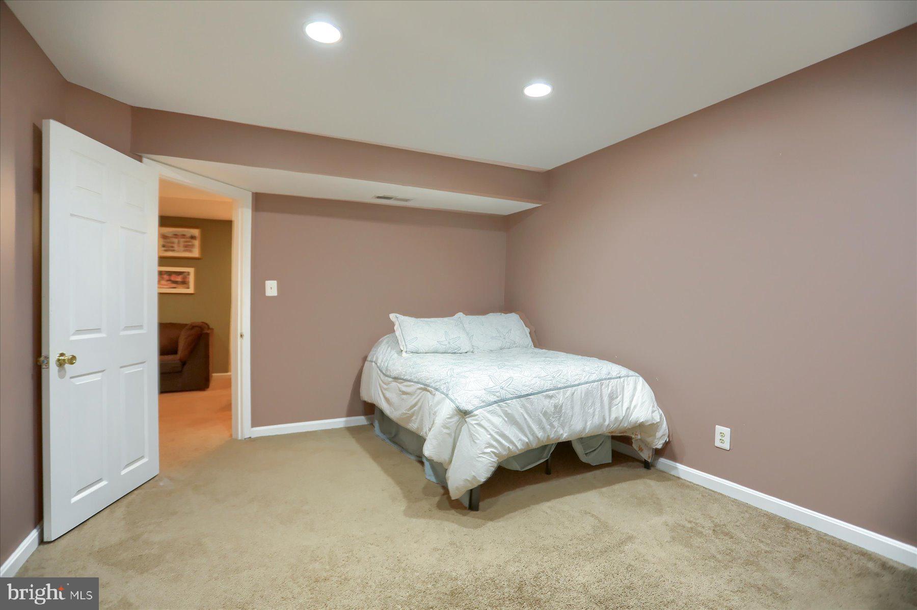 631 Prestwick Trail Bel Air, MD 21014 - Photo 47 of 64 a bed room with a bed and a night stand