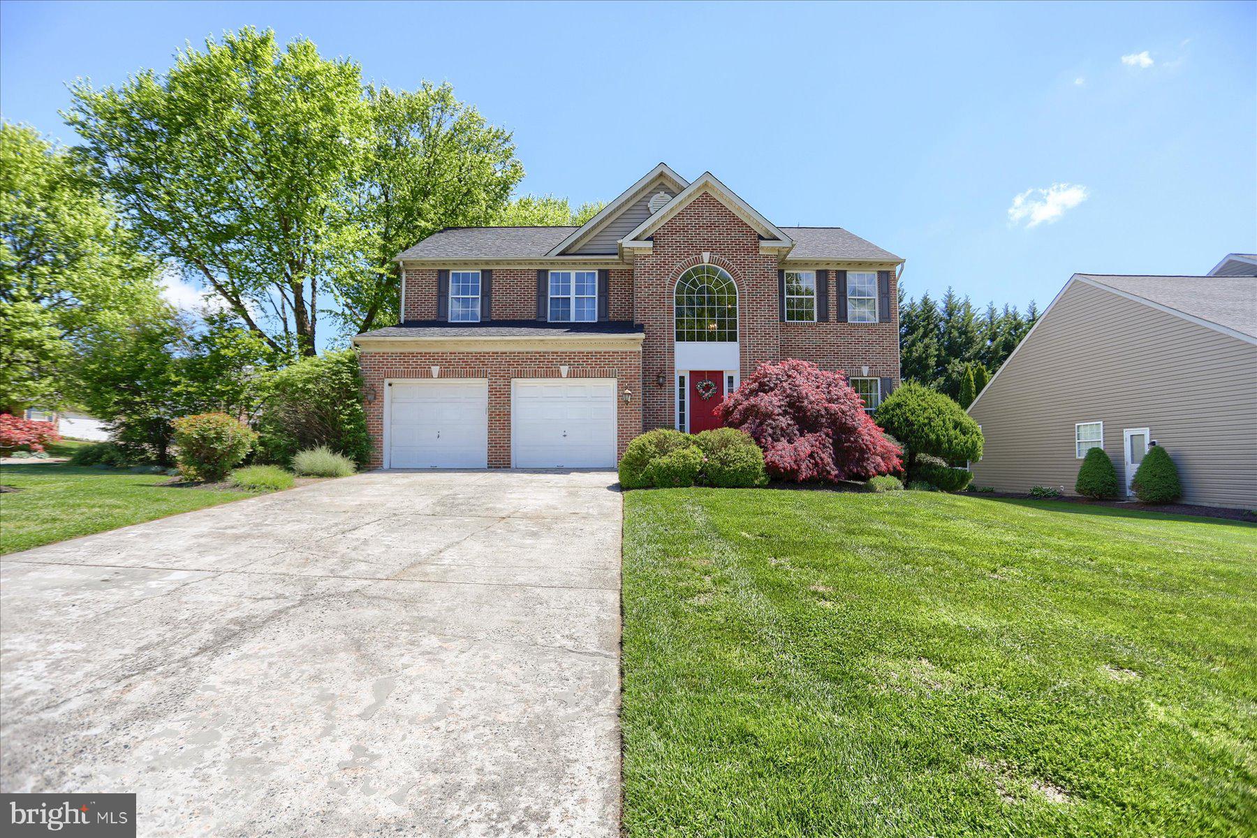 631 Prestwick Trail Bel Air, MD 21014 - Photo 51 of 64 a front view of a house with garden