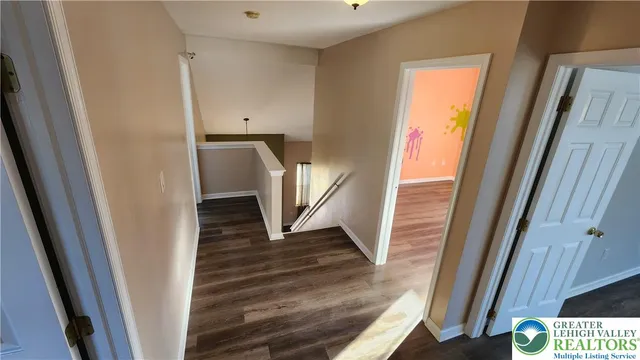 a view of front door with stairs