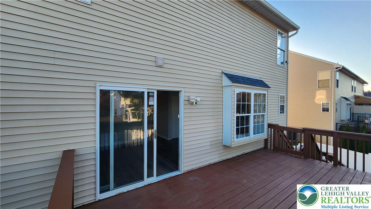 2285 Juniper Drive Coplay, PA 18037 - Photo 22 of 25 a view of a house with wooden deck