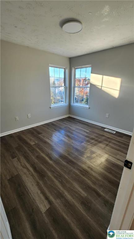 2285 Juniper Drive Coplay, PA 18037 - Photo 7 of 25 an empty room with wooden floor and windows