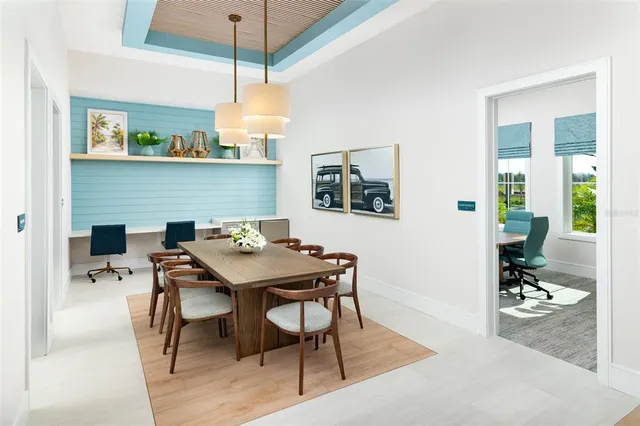 a view of a dining room with furniture