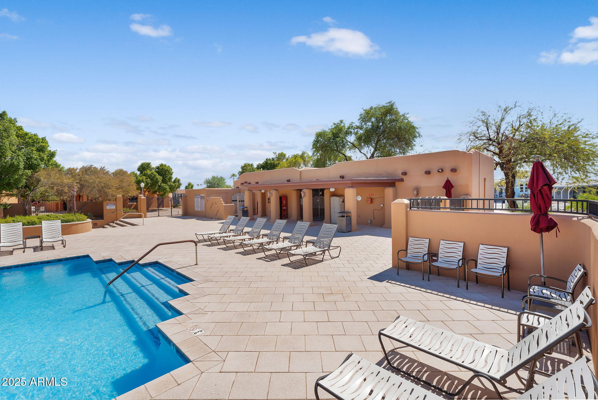 8865 East Baseline Road, Unit 802 Mesa, AZ 85209 - Photo 37 of 44 a view of a house with swimming pool