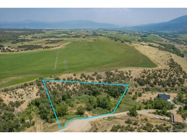 a view of a lake with a beach