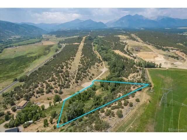 a view of a city with a lake