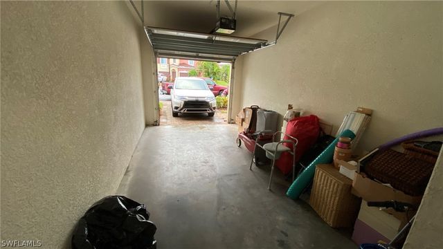 a view of a room with wooden floor and outer view