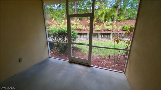 a view of a wooden house with a lake view