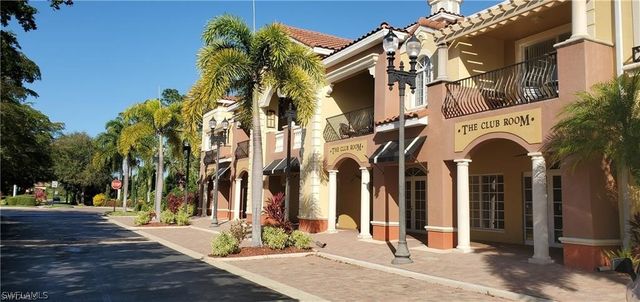 a swimming pool with outdoor seating and yard
