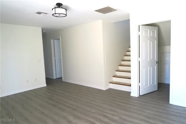 a view of entryway with wooden floor