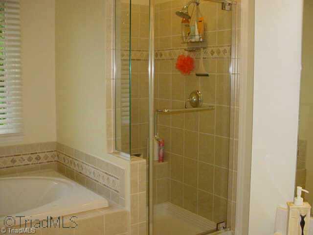 5406 Kingsbridge Road Winston-Salem, NC 27103 - Photo 9 of 9 Other. Jetted tub to melt away the work day blues and a fabulous tiled shower with built-in bench!