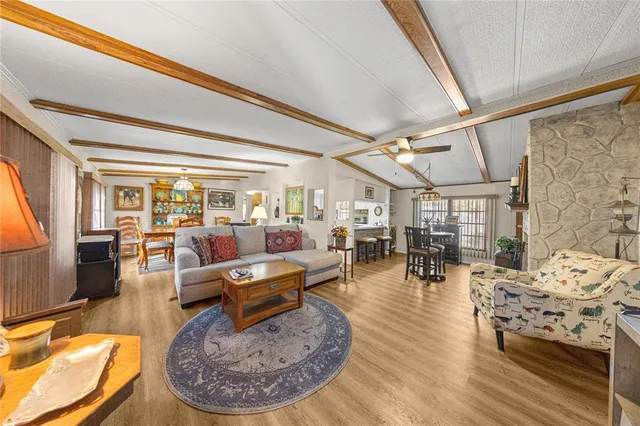 a living room with furniture and a table